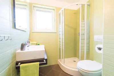 Kupaonica u objektu Apartments Seric