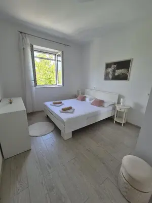 Krevet ili kreveti u jedinici u objektu lovely apartment