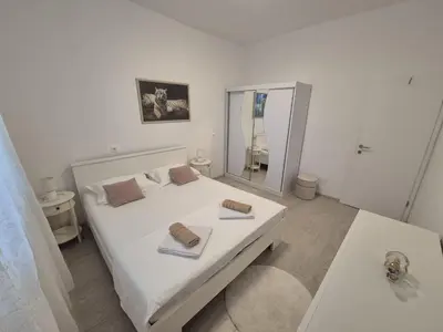 Krevet ili kreveti u jedinici u objektu lovely apartment