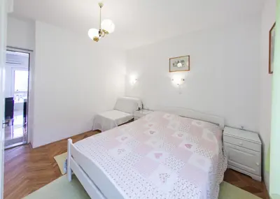 Krevet ili kreveti u jedinici u objektu Apartments Magdalena