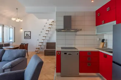 Kuhinja ili čajna kuhinja u objektu APARTMENTS BRUNO 1&2 - two-room penthouse apartments - wonderful panoramic view of the sea - the best location, first row to the beach - 10 minutes from Supetar ferry port - free secured parking - facilities nearby