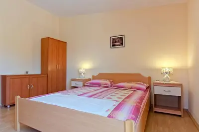 Krevet ili kreveti u jedinici u objektu Apartments Jerković