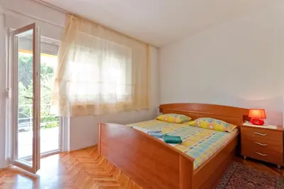 Krevet ili kreveti u jedinici u objektu Apartments Jerković