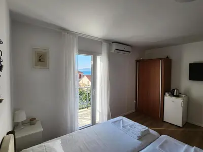 Krevet ili kreveti u jedinici u objektu Apartmani Neva Supetar