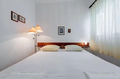 Krevet ili kreveti u jedinici u objektu Beachfront Apartment Pisak (196-1)