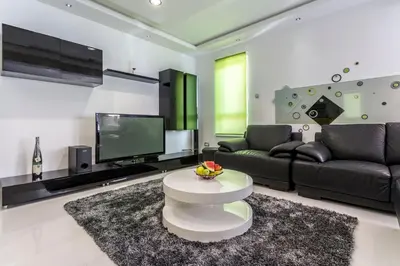 TV i/ili zabavni centar u objektu Sea Pearl Luxury Apartment