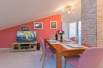 TV i/ili zabavni centar u objektu Abuela's Beach House