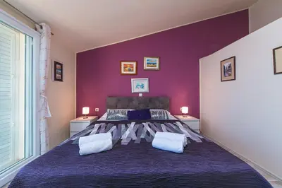 Krevet ili kreveti u jedinici u objektu Abuela's Beach House