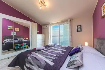Krevet ili kreveti u jedinici u objektu Abuela's Beach House