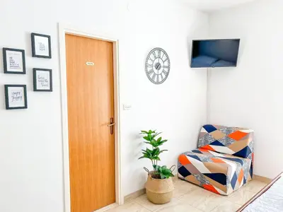 TV i/ili zabavni centar u objektu Apartment Holiday Makarska