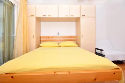 Krevet ili kreveti u jedinici u objektu Apartments Regina