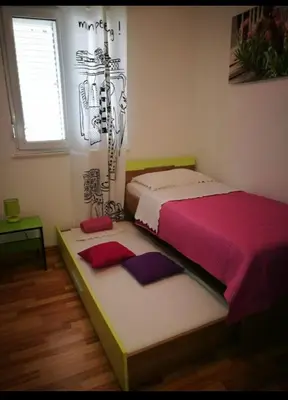 Krevet ili kreveti u jedinici u objektu Apartments with a parking space Podstrana, Split - 14934
