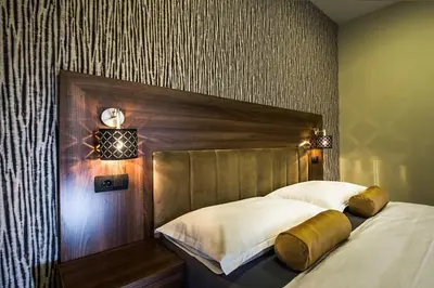Krevet ili kreveti u jedinici u objektu Central Luxury Rooms