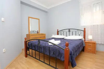 Krevet ili kreveti u jedinici u objektu Apartments with parking space Podstrana, Split - 10348