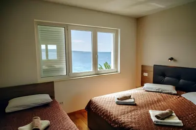 Krevet ili kreveti u jedinici u objektu Apartmens Beach house
