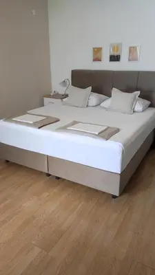 Krevet ili kreveti u jedinici u objektu Apartmani Valentino