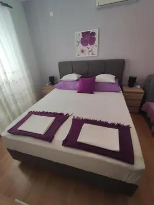 Krevet ili kreveti u jedinici u objektu Apartmani Valentino