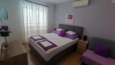 Krevet ili kreveti u jedinici u objektu Apartmani Valentino