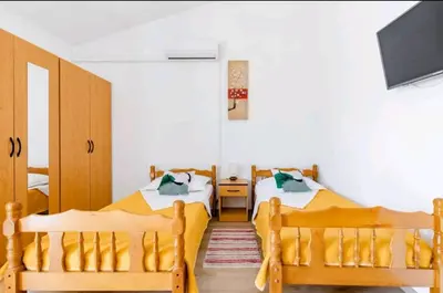 Krevet ili kreveti u jedinici u objektu Apartmani Račić