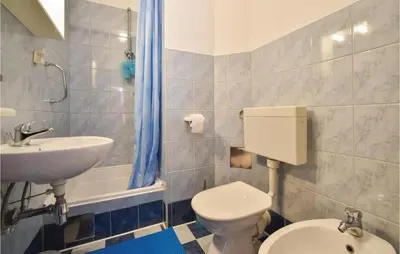 Kupaonica u objektu Three-Bedroom Apartment In Jesenice