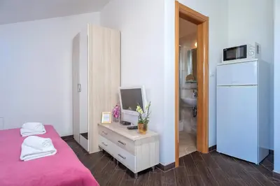 Krevet ili kreveti u jedinici u objektu Villa Fio - Rooms & Studio