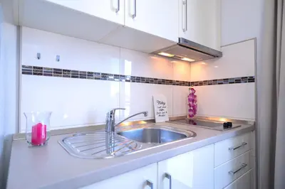 Kuhinja ili čajna kuhinja u objektu Villa Fio - Rooms & Studio
