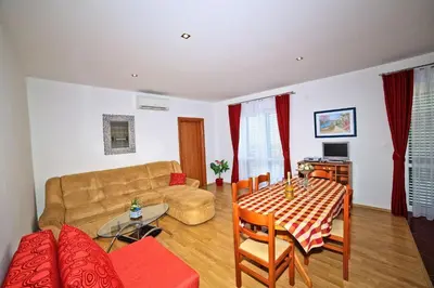 TV i/ili zabavni centar u objektu Apartments Bozikovic