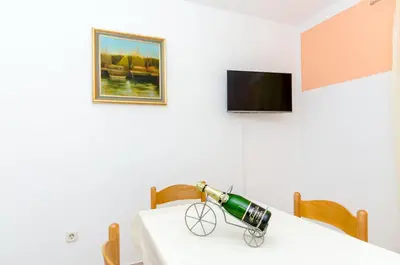 TV i/ili zabavni centar u objektu Apartments Mateo