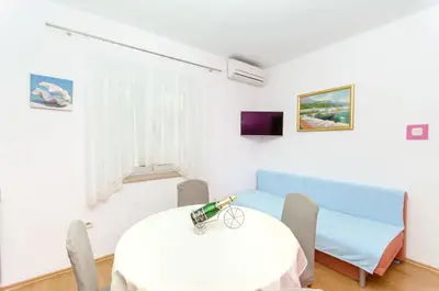 TV i/ili zabavni centar u objektu Apartments Mateo