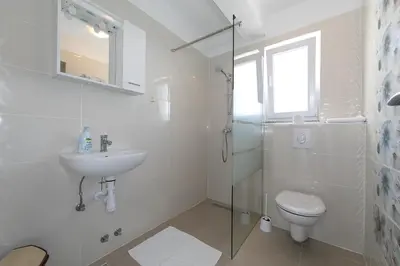 Kupaonica u objektu Villa Orada