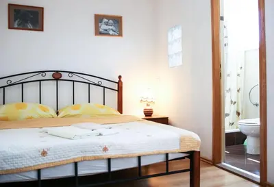 Krevet ili kreveti u jedinici u objektu Apartments by the sea Makarska - 15200