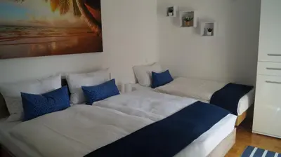 Krevet ili kreveti u jedinici u objektu Schönes Ferienhaus direkt am Meer