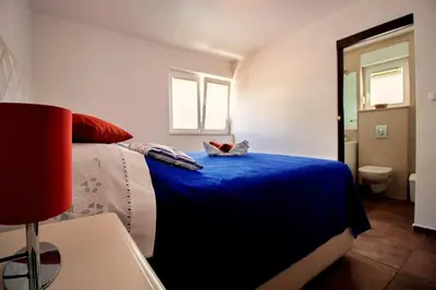 Krevet ili kreveti u jedinici u objektu Sandy Beach Apartments