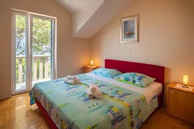 Krevet ili kreveti u jedinici u objektu Apartments by the sea Postira - Brac - 15242
