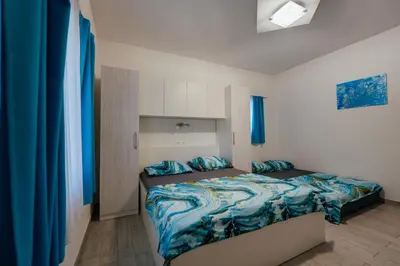 Krevet ili kreveti u jedinici u objektu Apartman M&S s bazenom Split - Podstrana