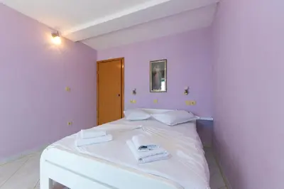 Krevet ili kreveti u jedinici u objektu Holiday Apartments Stomarica
