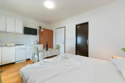Krevet ili kreveti u jedinici u objektu Holiday Apartments Stomarica