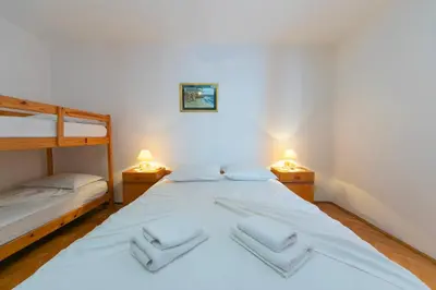 Krevet ili kreveti u jedinici u objektu Holiday Apartments Stomarica