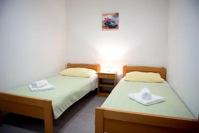 Krevet ili kreveti u jedinici u objektu Apartments and Rooms Robi