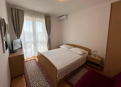 Krevet ili kreveti u jedinici u objektu Spacious family apartment near the beach