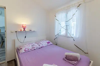Krevet ili kreveti u jedinici u objektu Family friendly house with a swimming pool Cove Koramaslinova - Koromaslinova, Brac - 15479