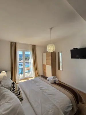 Krevet ili kreveti u jedinici u objektu Duje Apartments Milna