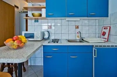 Kuhinja ili čajna kuhinja u objektu Apartments Cloud