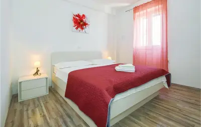 Krevet ili kreveti u jedinici u objektu Three-Bedroom Holiday Home In Stanici