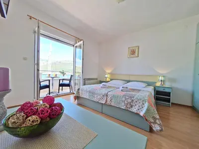 Krevet ili kreveti u jedinici u objektu Rooms and Apartments Porat