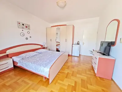 Krevet ili kreveti u jedinici u objektu Rooms and Apartments Porat