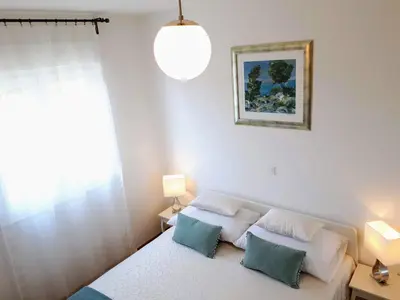 Krevet ili kreveti u jedinici u objektu Apartment ENI with garage parking