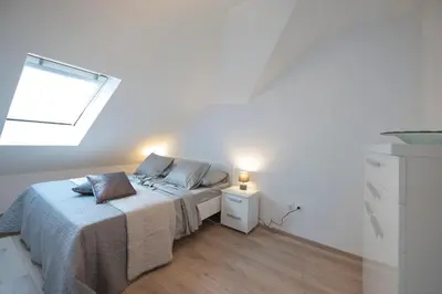 Krevet ili kreveti u jedinici u objektu The Roof - Luxury Apartment