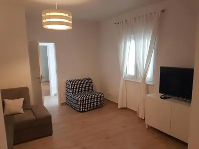 TV i/ili zabavni centar u objektu Sea view apartment with a huge terrace