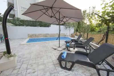 Bazen u objektu Family friendly apartments with a swimming pool Split - 14203 ili u blizini